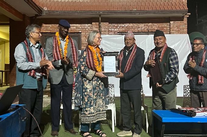 दोलखामा प्रा.डा. क्यारोल जिनेटी सम्मानित; प्रा.डा. श्याम जोशीका दुई कृतिको लोकार्पण